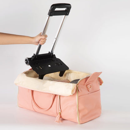 Pulling up the telescopic handle on the Rose Roller Edition